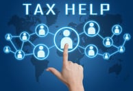 Tax Help concept with hand pressing social icons on blue world map background.